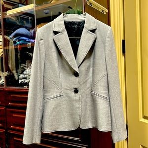 Navy blazer lined with detailed accent stitching